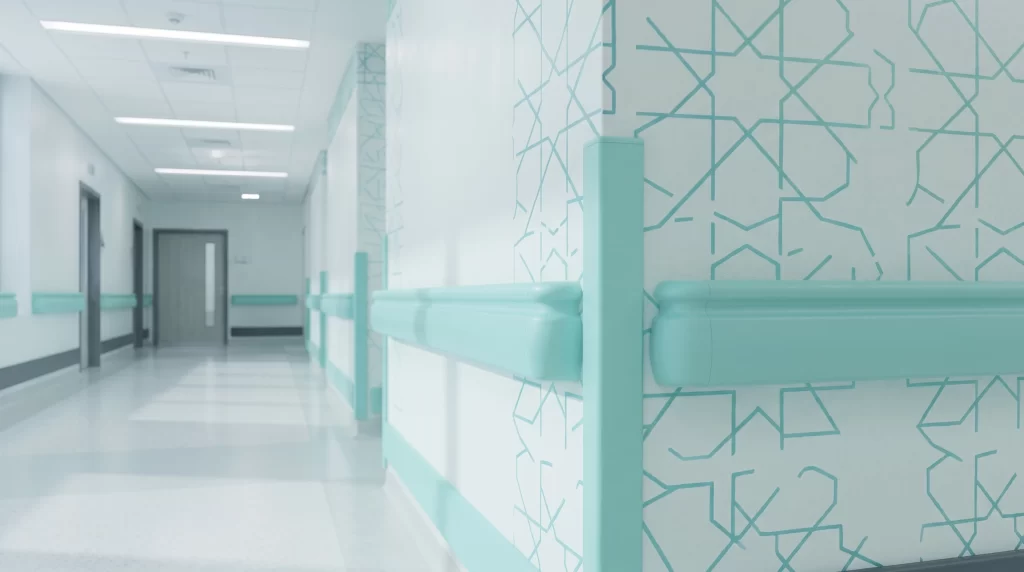 Inotect PRO-100E hospital handrail and corner guard system in soft mint green